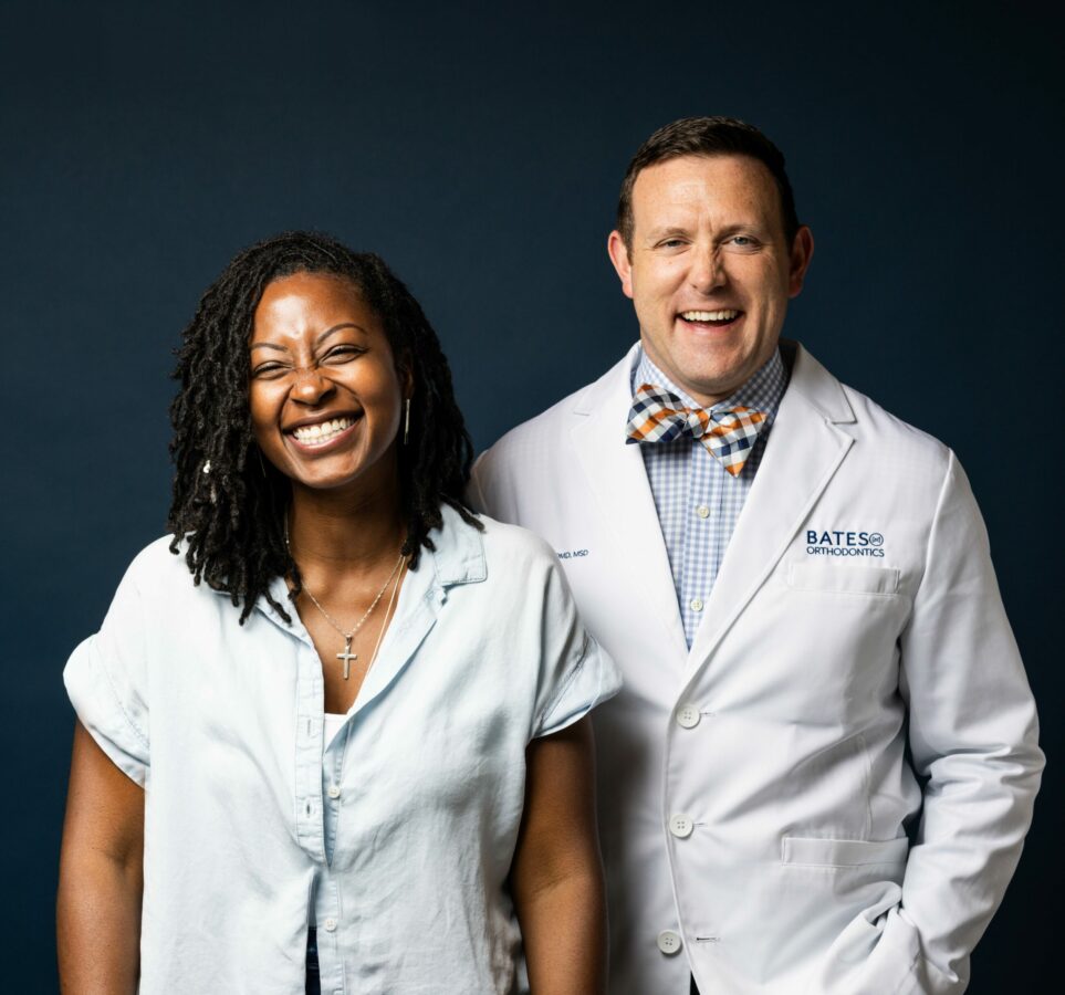 Dr. Sheldon Bates with Adult Patient Dr. Sheldon Bates with Invisalign Patient