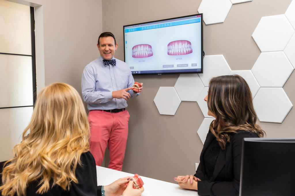 BatesLifestyleJPG-316 Dr. Bates Talks to Patient and Staff Member